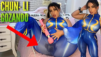 Fabulous costume play doll clothed as Chun Li from street fighter toying with her htachi hitachi spunking and drenching her underpants and trousers ahegao